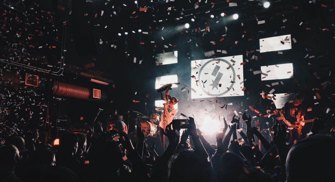 Crowd cheering at a concert
