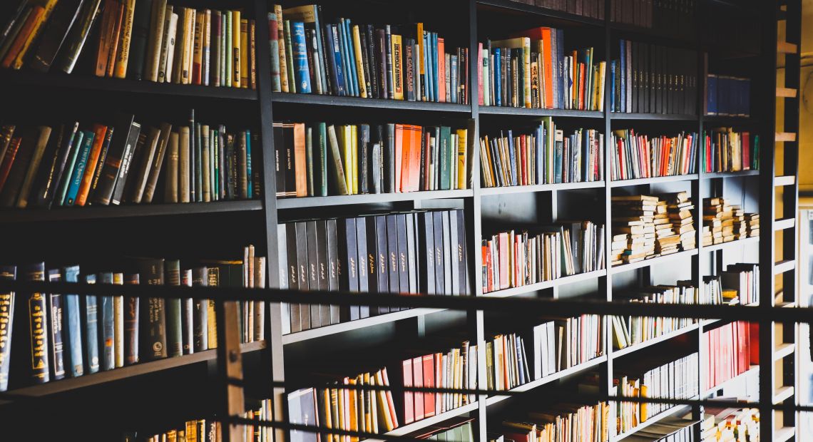 many bookshelves in a room