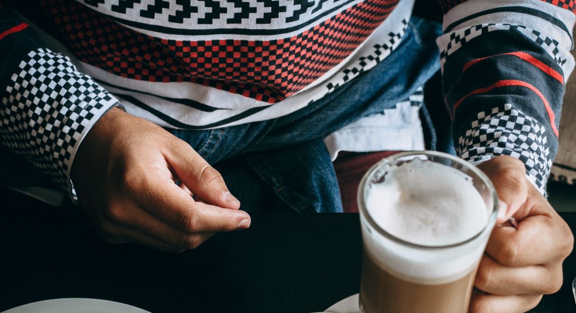 Man holding a cup of coffee