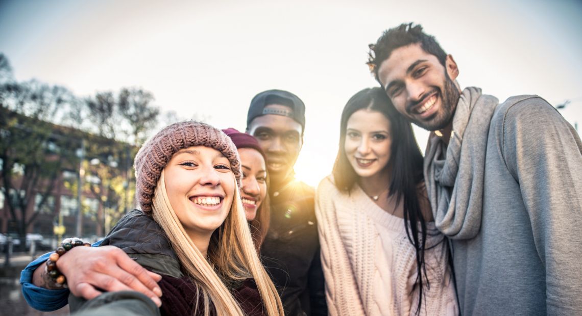 group of friends in winter outdoors