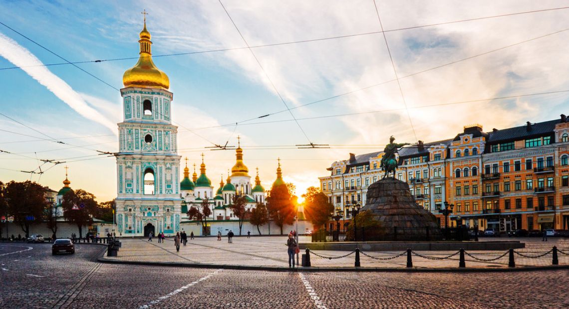 Girl running with Ukrainian flag