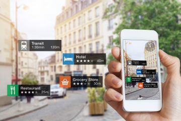 hand holding smartphone with popping up travelling tips with city on background