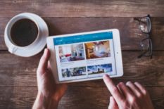 Man booking an apartment through Airbnb