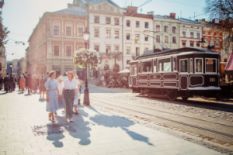 Women in vintage clothes stroll the Lviv street