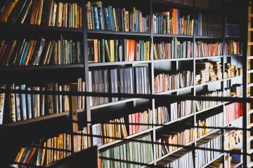 many bookshelves in a room