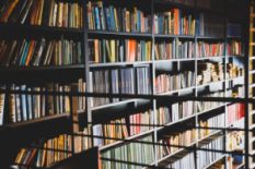 many bookshelves in a room