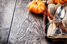 table setting with pumpkin and dry flowers