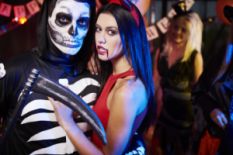 People in Halloween costumes at a party