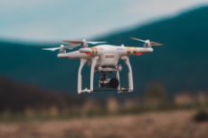 Drone flying over a field