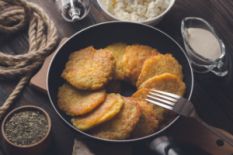 Ukrainian potato pancakes deruny with sour cream