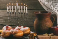 A menorah, sufganiyot and oil
