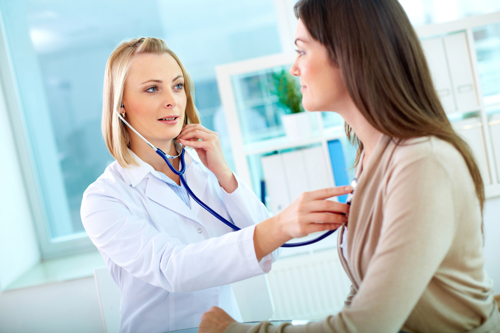 young female doctor with patient