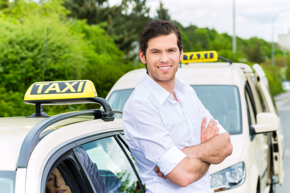 Driver in front of the cab