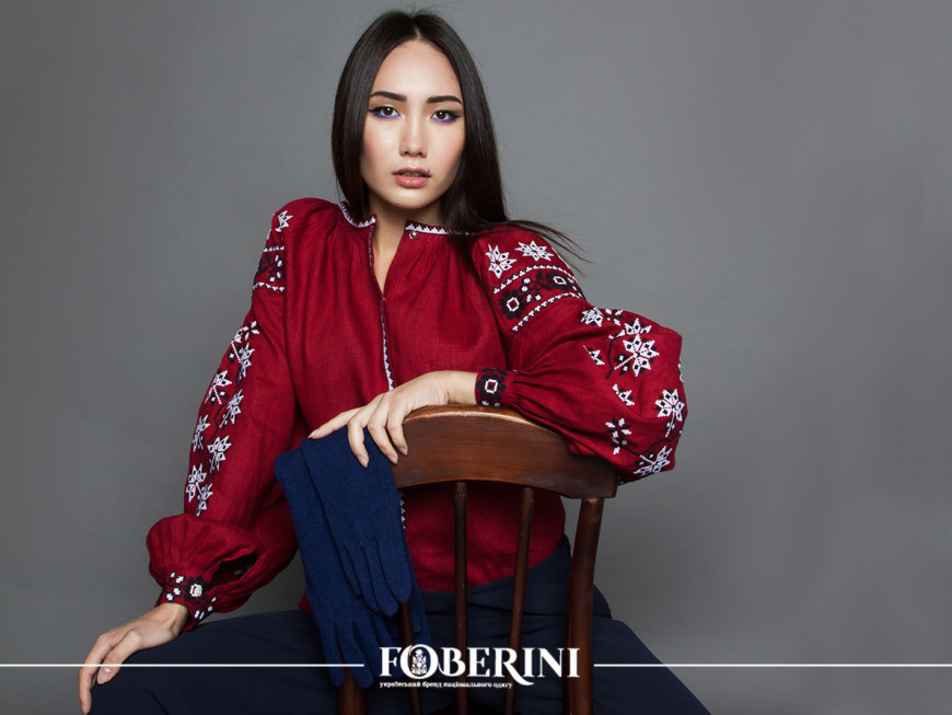 girl on a chair in red emroidered vyshyvanka