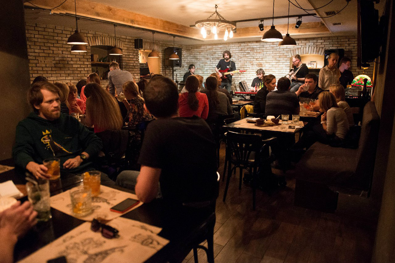 people sitting in a bar