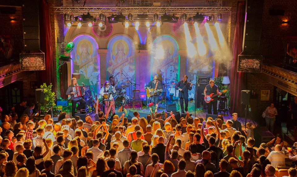 many people in club at music concert