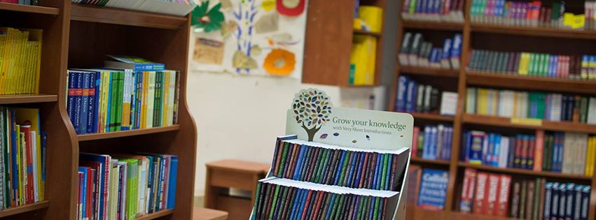 colorful books at shelves
