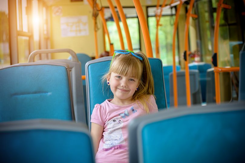 small girl in bus