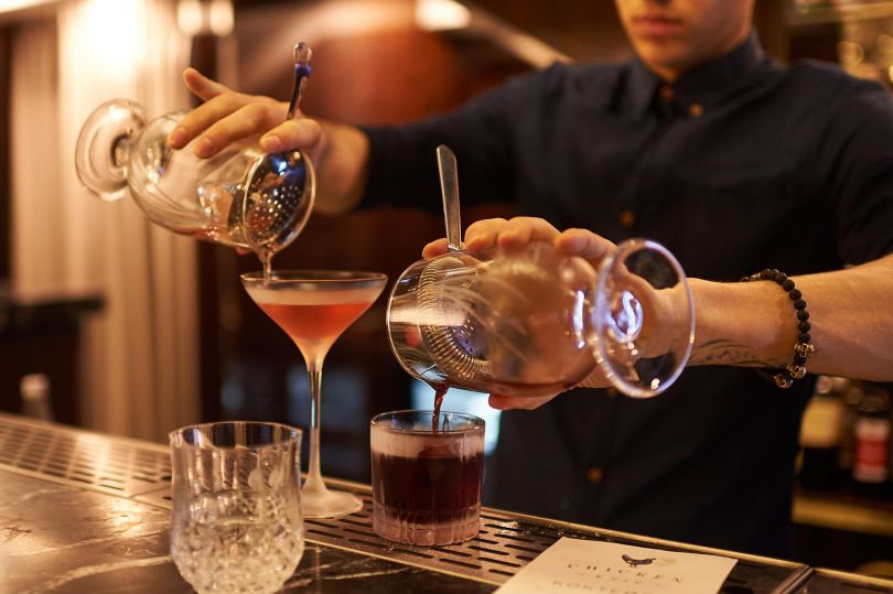 bartender hands making drink