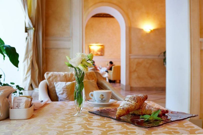 hotel bedroom with breakfast