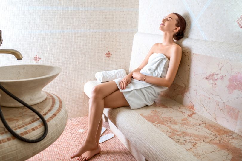Woman chilling in a Roma sauna