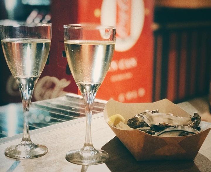 oysters and 2 glasses of wine