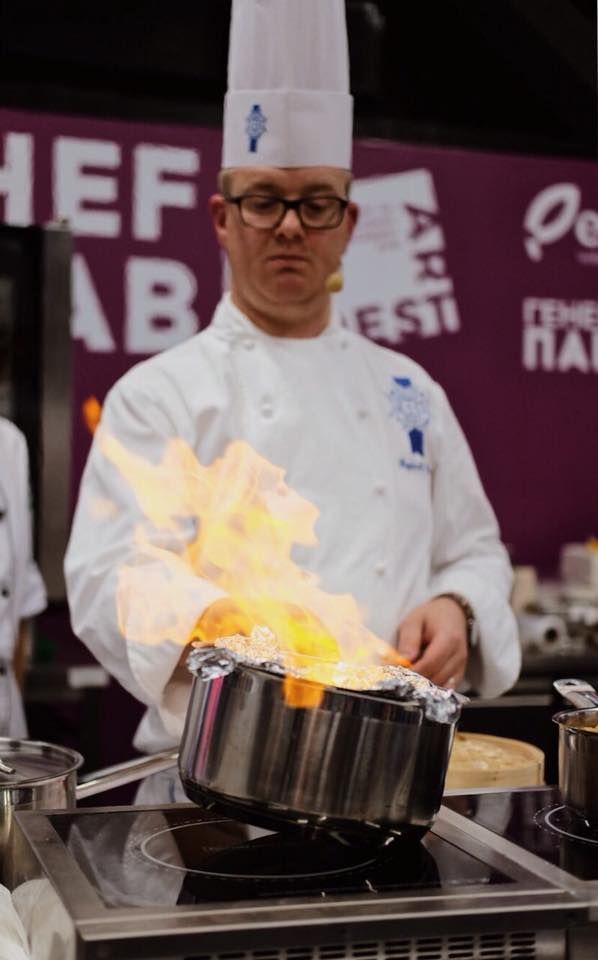 Reginald Ioos cooking in Kyiv