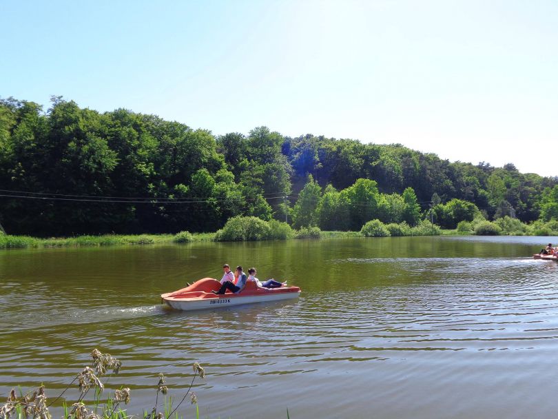people on boat on river