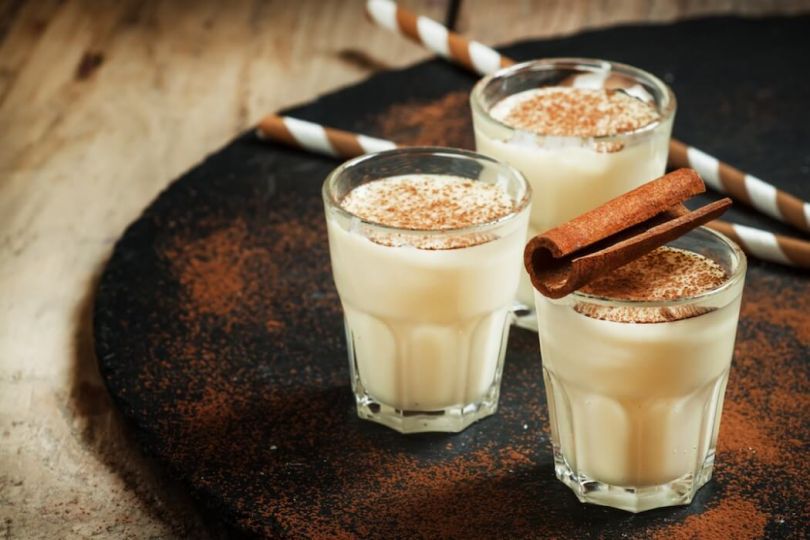 Gingerbread eggnog with cinnamon sticks