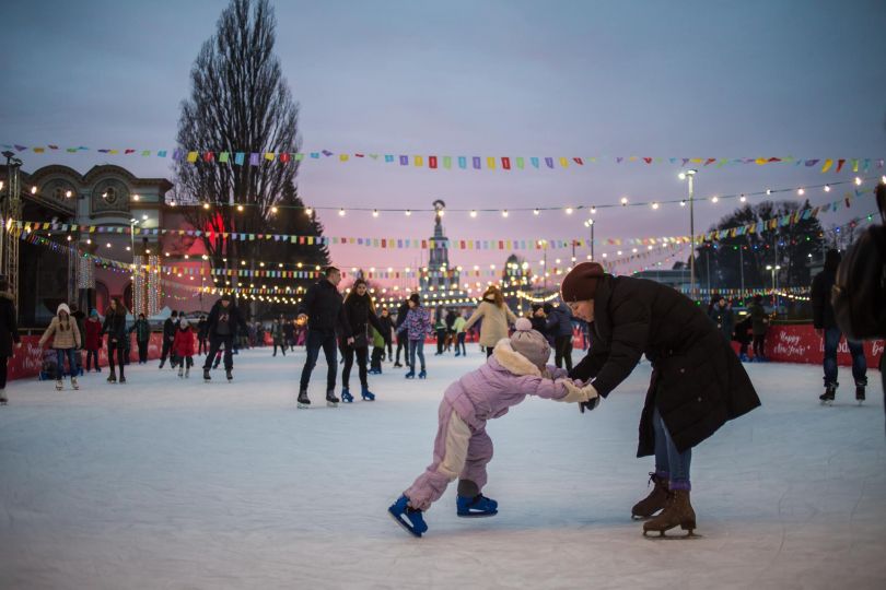 Mom and kid ice skating