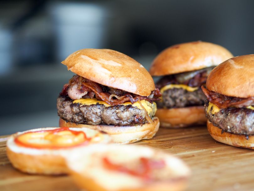 Burger with beef and tomatoes