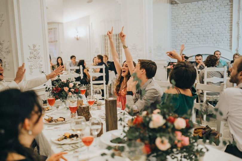 Guests cheering in Podkova restaurant