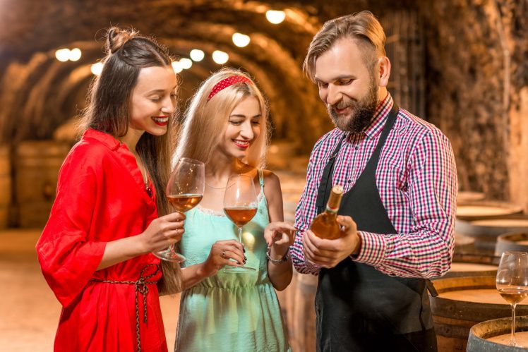 Bohdan on wine tasting with guests