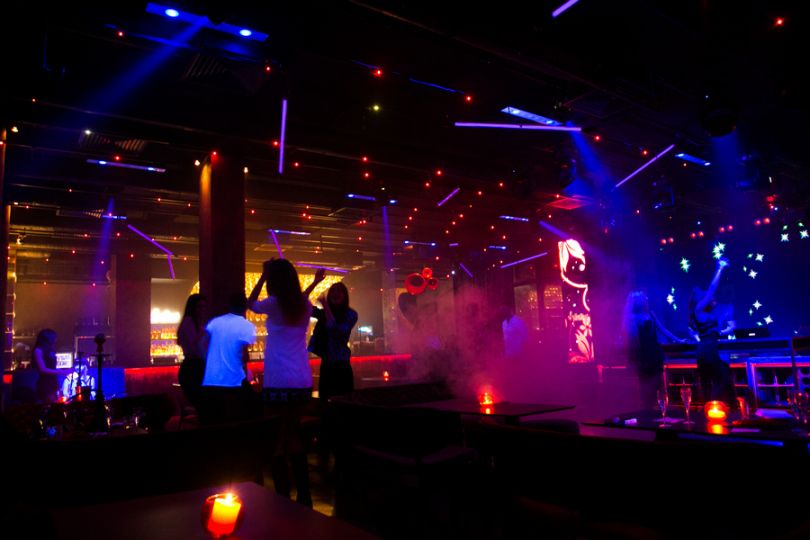 party in club in neon lights