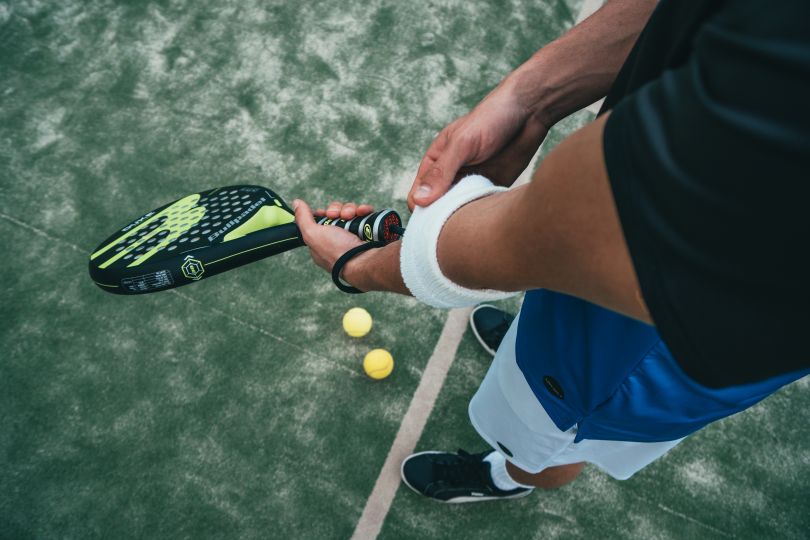 Man preparing to play tennis
