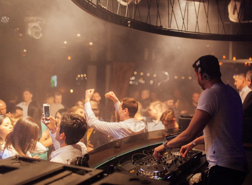 dj playing set in club