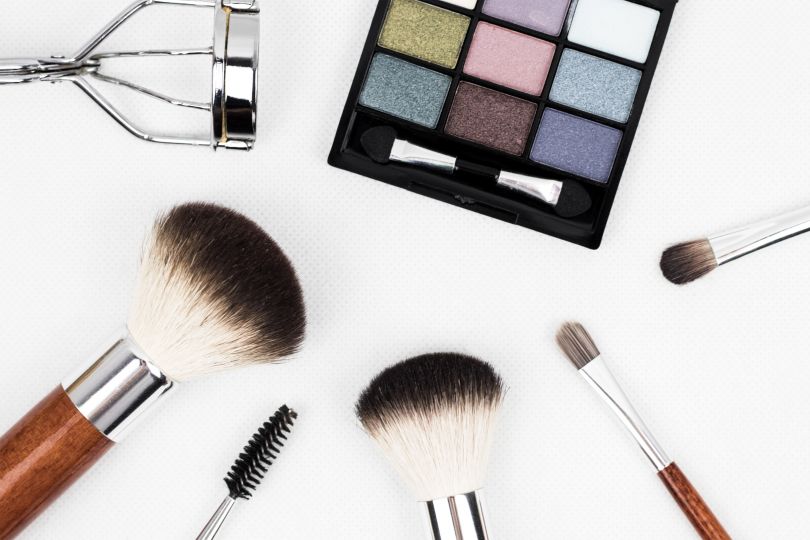Eyeshadow and brushes on the table